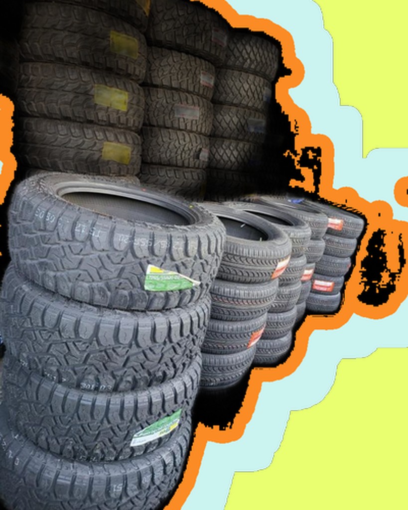 Stack of performance and all-terrain tires at Piedmont Tire